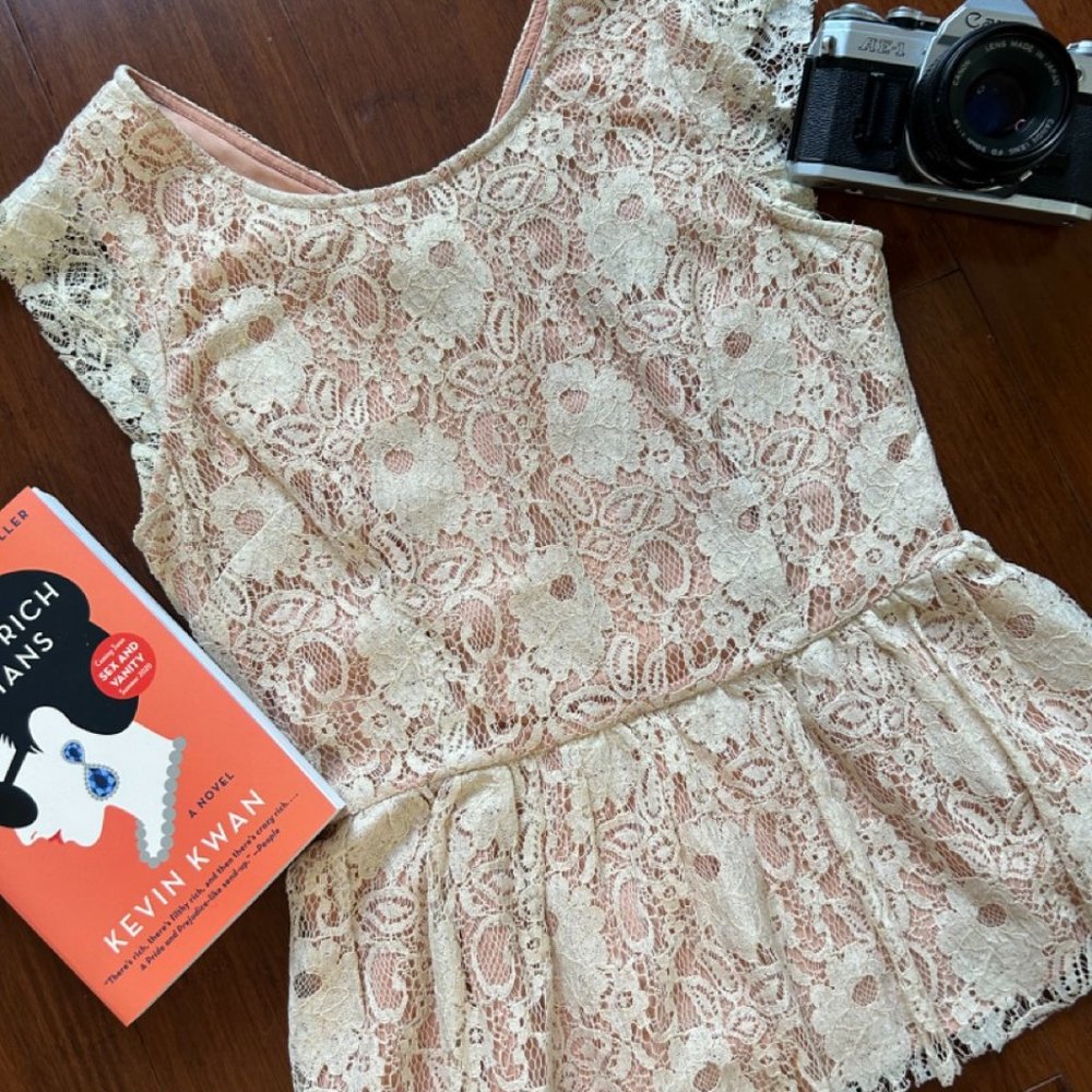 Anthropologie soft pink peplum lace top